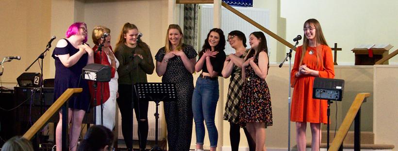 Singing on stage, performers at Summer Vibez 2019